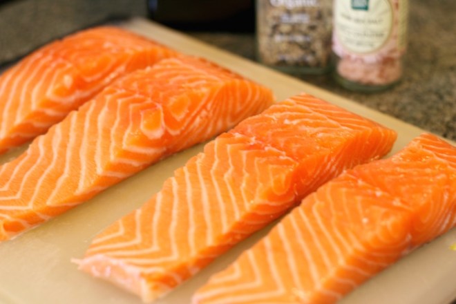 preparing-to-cook-salmon-fillets-in-pan
